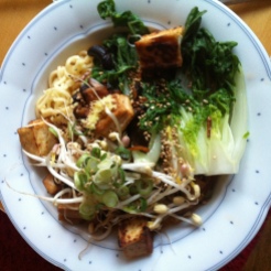 noodle soup with miso, tofu, greens, sprouts and ginger